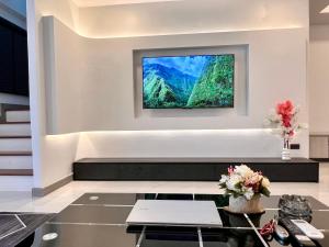 Telewizja i/lub zestaw kina domowego w obiekcie 芭提雅泰尚皇联排别墅