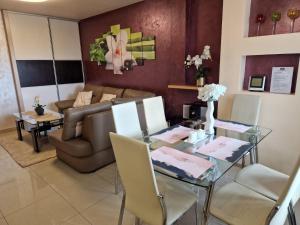 Posedenie v ubytovaní BUTOROWY RESIDENCE Apartament "GÓRSKA ORCHIDEA"
