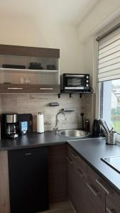 Η κουζίνα ή μικρή κουζίνα στο Schönes Appartement am Stadtpark Bochum