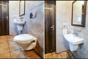 Koupelna v ubytování Hotel ShivMurti Classic + 25 fotografií