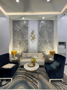 Зона вітальні в MBMJs Condo ONE Regis