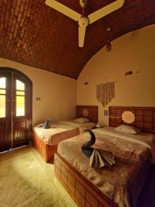 Postel nebo postele na pokoji v ubytování Nubian Soul Guest Houses