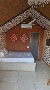 a bedroom with a large bed in a room at Great Escape Club Indore in Indore +14 photos