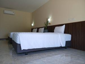 Postel nebo postele na pokoji v ubytování sp hotel