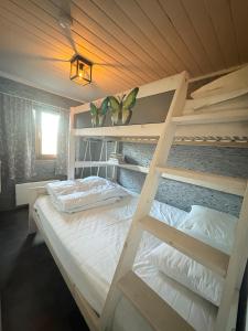 Postel nebo postele na pokoji v ubytování Chalet Le Daim La Boverie