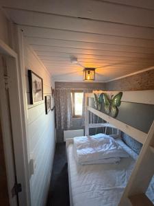 Postel nebo postele na pokoji v ubytování Chalet Le Daim La Boverie