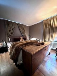 Ένα ή περισσότερα κρεβάτια σε δωμάτιο στο Cosy Penthouse Central Village +4 φωτογραφίες