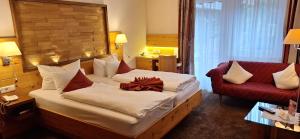 Postel nebo postele na pokoji v ubytování Hotel Restaurant Waldsägmühle
