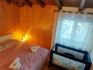 Postel nebo postele na pokoji v ubytování Appartamento Caprioli