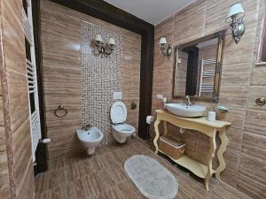 Koupelna v ubytování Pitesti House + 29 fotografií
