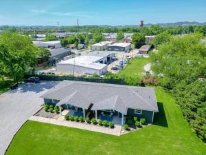 an overhead view of a large house with a roof at Ultra Relaxing and Fun Historic Franklin Bungalow in Franklin