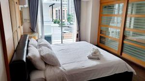 Postel nebo postele na pokoji v ubytování 6D-Short-term rental allowed-3BRs Downtown Bangkok + 95 fotografií