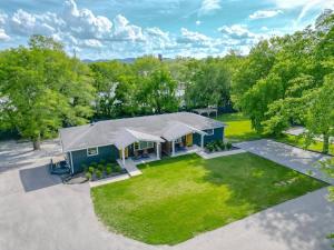 an overhead view of a blue house with a yard at Lovely Three Bedroom Home Historic Franklin Quadplex in Franklin