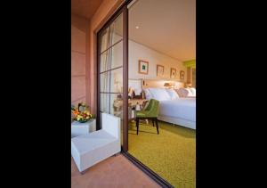 Postel nebo postele na pokoji v ubytování Riad Du Golf Suites - Marrakech