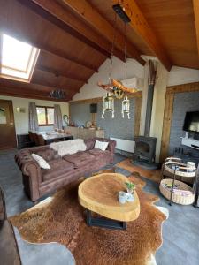 Posezení v ubytování Chalet Le Daim La Boverie