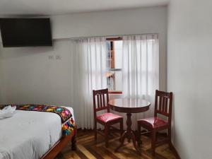 Letto o letti in una camera di Kantu hotel