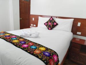 Letto o letti in una camera di Kantu hotel
