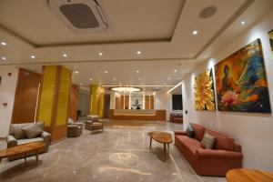 Posezení v ubytování Hotel Tathagat Ashok