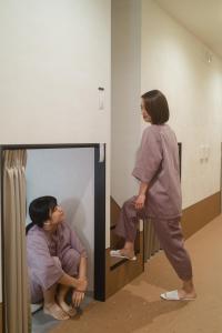 Hosté ubytování HOTEL minimumms女性専用カプセルホテルWomen only hotel