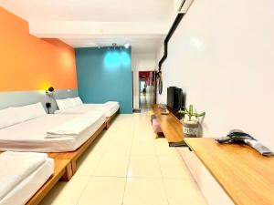 Televiisor ja/või meelelahutuskeskus majutusasutuses SNUG·NINE Hotel