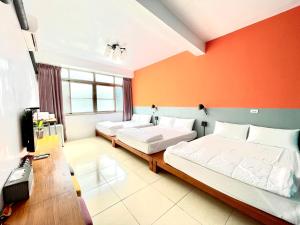 Voodi või voodid majutusasutuse SNUG·NINE Hotel toas