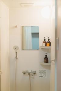 Koupelna v ubytování HOTEL minimumms女性専用カプセルホテルWomen only hotel