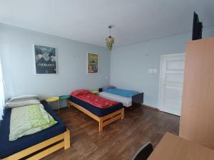 Postel nebo postele na pokoji v ubytování Noclegi nad S-ką