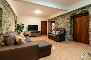 TV a/nebo společenská místnost v ubytování Sunset House