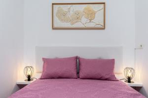 Postel nebo postele na pokoji v ubytování Sunset House