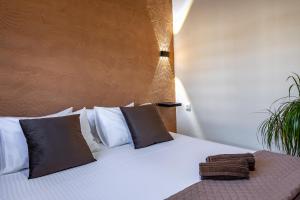 Posteľ alebo postele v izbe v ubytovaní D&A Apartments