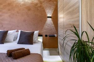 Posteľ alebo postele v izbe v ubytovaní D&A Apartments