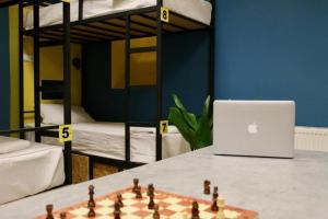 Llit o llits en una habitació de Scary Hostel