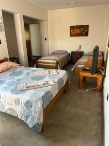 Voodi või voodid majutusasutuse KAD Alojamiento toas