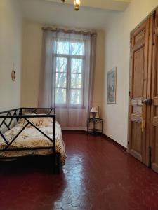 Postel nebo postele na pokoji v ubytování Appartement avec terrasse en Provence