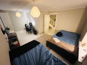 Rúm í herbergi á Traumhaus, Sauna, Whirlpool, grosse Terrasse mit Aussicht, Seeanstoss