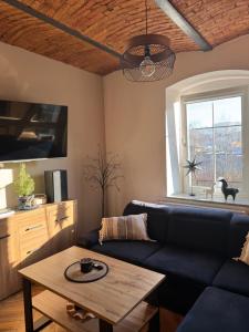 Posedenie v ubytovaní Dawna Mleczarnia Apartamenty LOFT
