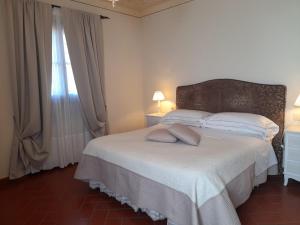 Voodi või voodid majutusasutuse Agriturismo Poggio de Papi toas