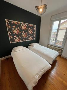 Postel nebo postele na pokoji v ubytování Maison Jean-Pierre + 10 fotografií