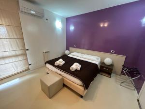 Postel nebo postele na pokoji v ubytování B&B Elia's