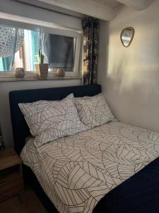 Posteľ alebo postele v izbe v ubytovaní Dawna Mleczarnia Apartamenty LOFT