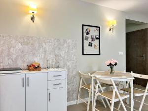 Η κουζίνα ή μικρή κουζίνα στο Port Apartamenty Szczecin - Stare Miasto