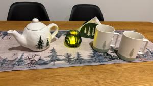 Gościejówka na skraju lasu的咖啡和沏茶工具