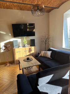 Posedenie v ubytovaní Dawna Mleczarnia Apartamenty LOFT