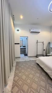 A bed or beds in a room at rawaa chalet