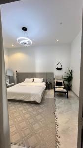 A bed or beds in a room at rawaa chalet