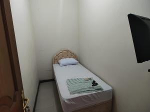 TV a/nebo společenská místnost v ubytování Omah Tirtodipuran