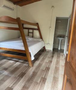 Postel nebo postele na pokoji v ubytování Hostal Ancestrales Capurgana + 5 fotografií