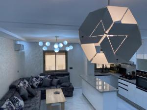 Kuchyň nebo kuchyňský kout v ubytování appartement bades alhoceima