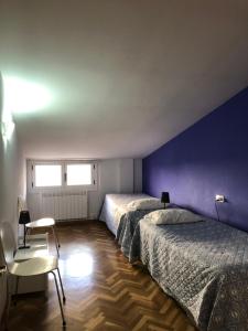 Posteľ alebo postele v izbe v ubytovaní Apartamento Turístico Sigüenza
