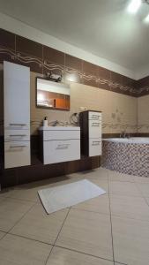 Kuchyňa alebo kuchynka v ubytovaní Apartmán Pavlík